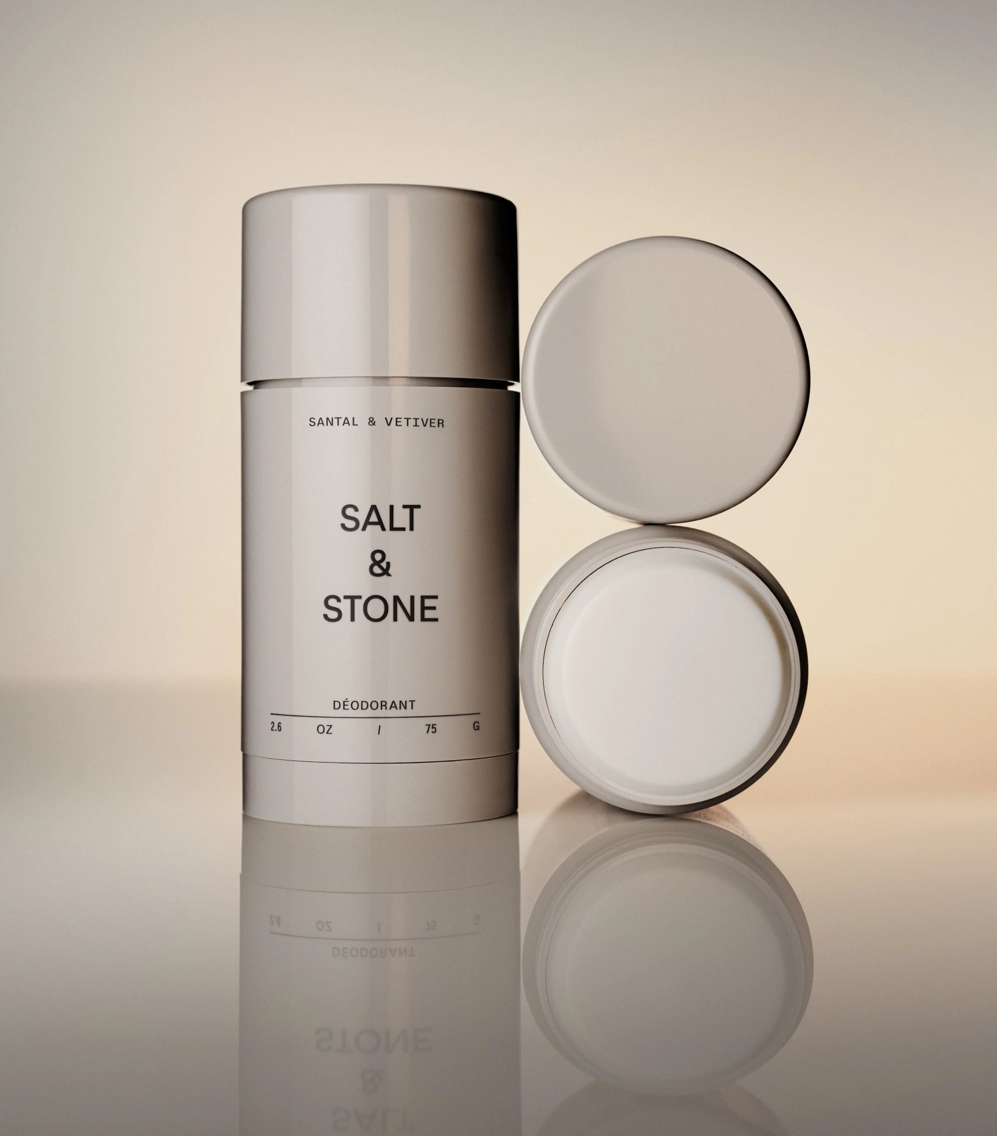 Salt and Stone deodorant on a warm reflective surface